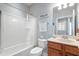 Full bathroom with tub shower combo at 1589 Pixley St, Charleston, SC 29414