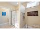 Bathroom with shower and built-in storage at 1589 Pixley St, Charleston, SC 29414