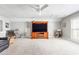 Spacious bonus room with carpeted floor, large TV, and ample seating at 1589 Pixley St, Charleston, SC 29414