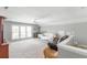 Open bonus room with plenty of natural light and seating at 1589 Pixley St, Charleston, SC 29414