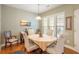 Bright dining room featuring an oval table and four chairs at 1589 Pixley St, Charleston, SC 29414