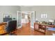 Home office with French doors opening to living room at 1589 Pixley St, Charleston, SC 29414