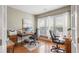 Bright home office features built-in desk and hardwood floors at 1589 Pixley St, Charleston, SC 29414