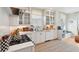 Bright white kitchen with stainless steel appliances and copper accents at 17 Bennett St, Charleston, SC 29401