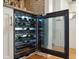 Built-in wine cooler with glass door, showcasing an impressive wine collection at 17 Bennett St, Charleston, SC 29401