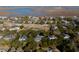 Aerial view of charming coastal town with marsh and tennis courts at 1738 Ion Ave, Sullivans Island, SC 29482