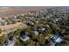 Aerial view of charming coastal town with waterfront and historic homes at 1738 Ion Ave, Sullivans Island, SC 29482