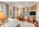 Spacious bedroom with hardwood floors and built-in desk at 1738 Ion Ave, Sullivans Island, SC 29482