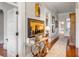 Elegant hallway with hardwood floors and unique decor at 1738 Ion Ave, Sullivans Island, SC 29482