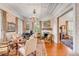 Charming living room with hardwood floors, ornate fireplace, and piano at 1738 Ion Ave, Sullivans Island, SC 29482