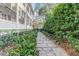 Landscaped walkway leading to a private gate at 1738 Ion Ave, Sullivans Island, SC 29482