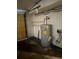 Garage interior with water heater and storage shelves at 1972 Green Park Ave, Charleston, SC 29414