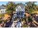 Two-story house with front porch and attached garage at 2166 Brown Pelican Ln, Charleston, SC 29412