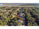 Aerial view of a house in a neighborhood near water at 2166 Brown Pelican Ln, Charleston, SC 29412