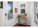 Inviting entryway with console table and artwork at 2166 Brown Pelican Ln, Charleston, SC 29412