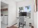 Convenient laundry room with washer, dryer, and workspace at 2166 Brown Pelican Ln, Charleston, SC 29412