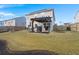 Large backyard with patio, pergola, and grill at 230 Wathen Dr, Goose Creek, SC 29445