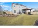 Spacious backyard with patio, pergola, and water feature at 230 Wathen Dr, Goose Creek, SC 29445