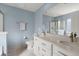 Double vanity bathroom with a large mirror and shower at 230 Wathen Dr, Goose Creek, SC 29445