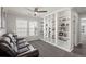 Spacious library with built-in shelving and plush seating at 230 Wathen Dr, Goose Creek, SC 29445