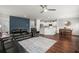 Open living area features hardwood floors, a cozy seating area, and an island kitchen at 230 Wathen Dr, Goose Creek, SC 29445