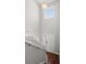 Staircase with gray carpet, hardwood flooring, and a view of the entry door at 230 Wathen Dr, Goose Creek, SC 29445