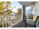 Relaxing balcony with seating area and neighborhood views at 2335 Tall Sail Dr # 508H, Charleston, SC 29414