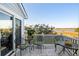 Relaxing deck overlooking marsh views with outdoor seating at 2335 Tall Sail Dr # 508H, Charleston, SC 29414