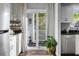 Bright kitchen with sliding door leading to a balcony at 2335 Tall Sail Dr # 508H, Charleston, SC 29414