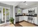 Modern kitchen with stainless steel appliances and access to balcony at 2335 Tall Sail Dr # 508H, Charleston, SC 29414