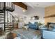 Open living room featuring a cozy fireplace and ample seating at 2335 Tall Sail Dr # 508H, Charleston, SC 29414