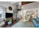 Open living area with spiral staircase and modern decor at 2335 Tall Sail Dr # 508H, Charleston, SC 29414