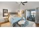 Spacious main bedroom with water views and sitting area at 2335 Tall Sail Dr # 508H, Charleston, SC 29414