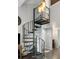 Unique spiral staircase leading to upper level at 2335 Tall Sail Dr # 508H, Charleston, SC 29414
