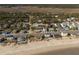 Aerial view of a beach house community near the coast at 305 Matilda St, Edisto Beach, SC 29438