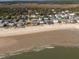 Aerial view showcasing a beach house and its surroundings at 305 Matilda St, Edisto Beach, SC 29438
