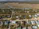 Aerial view of a beach house community with marsh views at 305 Matilda St, Edisto Beach, SC 29438