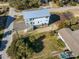 Aerial view of a two-story home with metal roof at 305 Matilda St, Edisto Beach, SC 29438