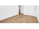 Spacious bedroom featuring hardwood floors and an adjacent closet at 305 Matilda St, Edisto Beach, SC 29438