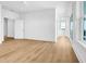 Bright and spacious bedroom with hardwood floors and access to a balcony at 305 Matilda St, Edisto Beach, SC 29438
