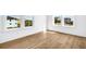 Bright bedroom with hardwood floors and ocean views at 305 Matilda St, Edisto Beach, SC 29438