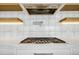 Stainless steel gas cooktop with modern vent hood at 305 Matilda St, Edisto Beach, SC 29438