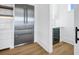 Stainless steel refrigerator and wine cooler in a kitchen alcove at 305 Matilda St, Edisto Beach, SC 29438