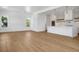 Bright living room with hardwood floors and natural light at 305 Matilda St, Edisto Beach, SC 29438