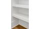 Open shelving in a bright white pantry at 305 Matilda St, Edisto Beach, SC 29438