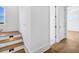 Modern staircase with wood steps and LED lighting at 305 Matilda St, Edisto Beach, SC 29438