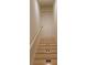 Modern stairs with wood steps and recessed lighting at 305 Matilda St, Edisto Beach, SC 29438