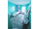 Charming bedroom with teal walls, a mermaid theme, and a comfy bed at 319 Bradley Bend Dr, Moncks Corner, SC 29461