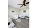 Adorable bedroom featuring twin beds, nature-themed decor, and gray flooring at 319 Bradley Bend Dr, Moncks Corner, SC 29461
