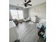 Charming bedroom with two twin beds, gray walls, and wood-look flooring at 319 Bradley Bend Dr, Moncks Corner, SC 29461